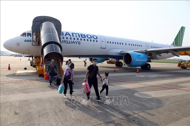  Hành khách đi trên chuyến bay của Bamboo Airways. Ảnh minh họa: Huy Hùng/TTXVN