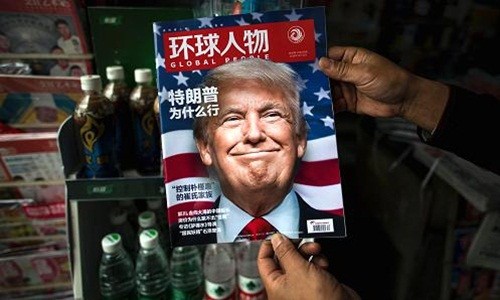 Ông Donald Trump xuất hiện trên trang bìa một tạp chí Trung Quốc. Ảnh: AFP 