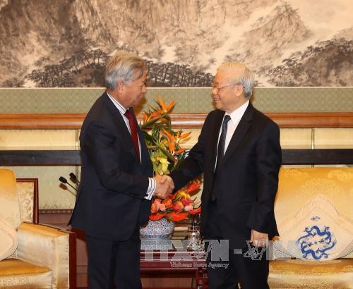 Tổng Bí thư Nguyễn Phú Trọng và Chủ tịch Ngân hàng AIIB Kim Lập Quần