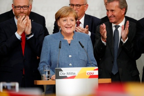 Thủ tướng Đức Angela Merkel phát biểu mừng chiến thắng với nhiệm kỳ thứ 4. Ảnh: Reuters.