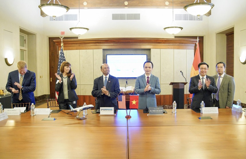 Lễ ký kết diễn ra tại Phòng Thương mại Mỹ dưới sự chứng kiến của Phó Thủ tướng Chính phủ Vương Đình Huệ.