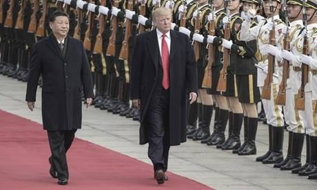 Chủ tịch Trung Quốc Tập Cận Bình và Tổng thống Mỹ Donald Trump trong lễ đón chính thức tại Bắc Kinh ngày 9/11. Ảnh: AFP