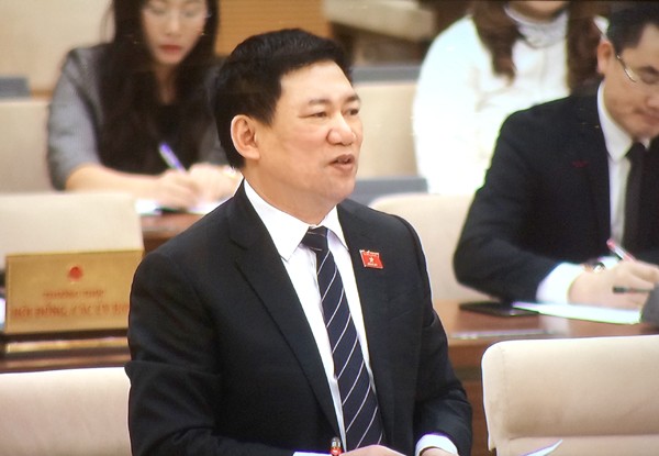 Tổng Kiểm toán Nhà nước Hồ Đức Phớc trình bày Tờ trình. Ảnh: VGP/Nguyễn Hoàng