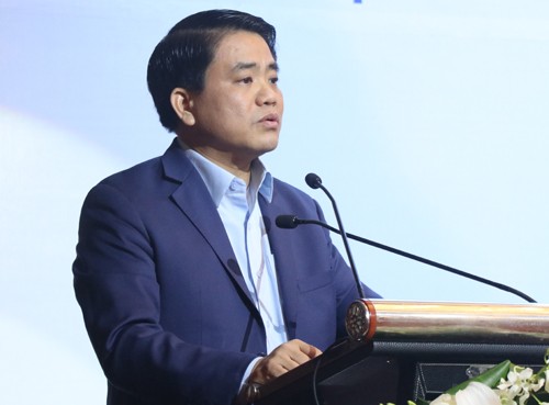 Chủ tịch UBND TP Hà Nội Nguyễn Đức Chung phát biểu tại hội thảo về cây xanh, hồ nước sáng 13/1. Ảnh: Võ Hải