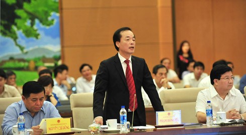 Bộ trưởng Bộ Xây dựng Phạm Hồng Hà phát biểu tại một phiên họp Ủy ban Thường vụ Quốc hội. - Ảnh: VGP