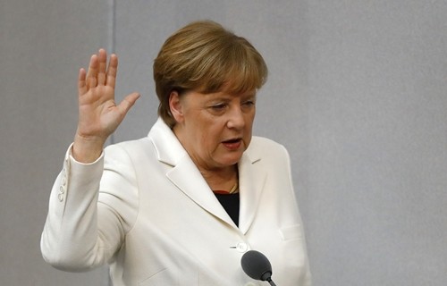Bà Angela Merkel tuyên thệ nhậm chức thủ tướng Đức ngày 14/3. Ảnh: Reuters.
