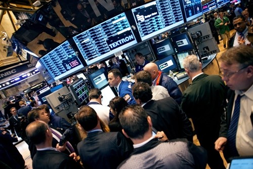 Trader trên sàn chứng khoán New York (NYSE). Ảnh: AFP