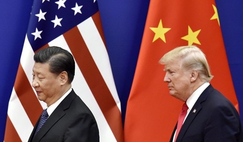 Chủ tịch Trung Quốc - Tập Cận Bình và Tổng thống Mỹ - Donald Trump. Ảnh: Kyodo.