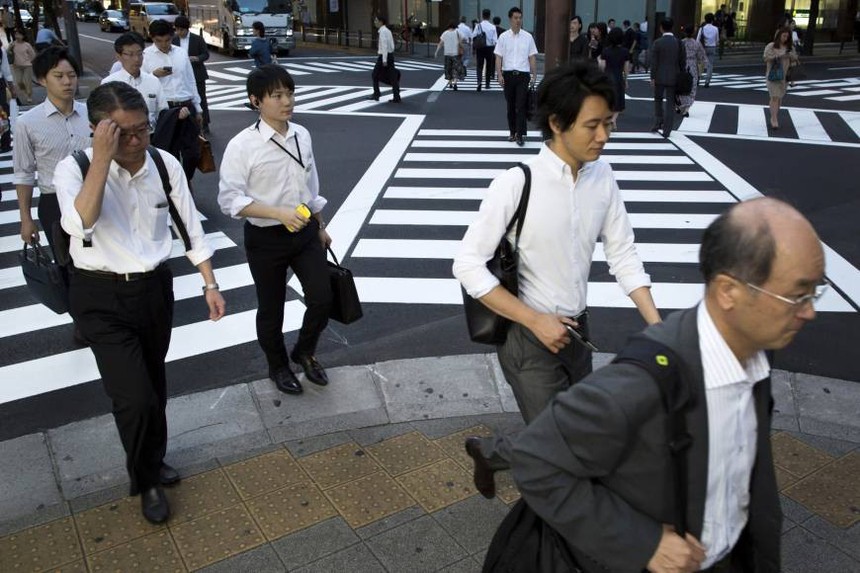 Nhật Bản đang phải "đau đầu" tìm cách đối phó với vấn nạn "nghiện" công việc của người lao động nước này. (Ảnh minh họa: Japan Times).