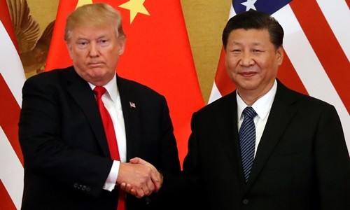 Tổng thống Mỹ Trump (trái) và Chủ tịch Trung Quốc Tập Cận Bình ở Bắc Kinh tháng 11/2017. Ảnh: Reuters.