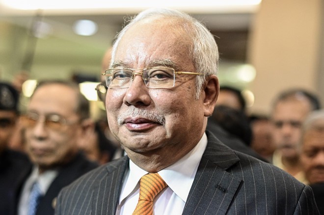 Ông Najib Razak đến tòa vào ngày 11.11. AFP
