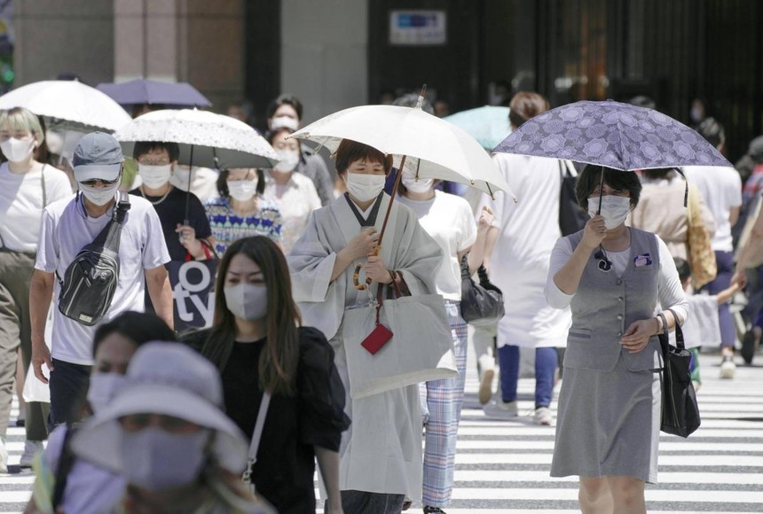 Nhiều ý kiến chuyên gia cho rằng sự kiện Olympic Tokyo 2020 cũng khiến cho số ca nhiễm tại Nhật Bản tăng nhanh. (Ảnh: AP).