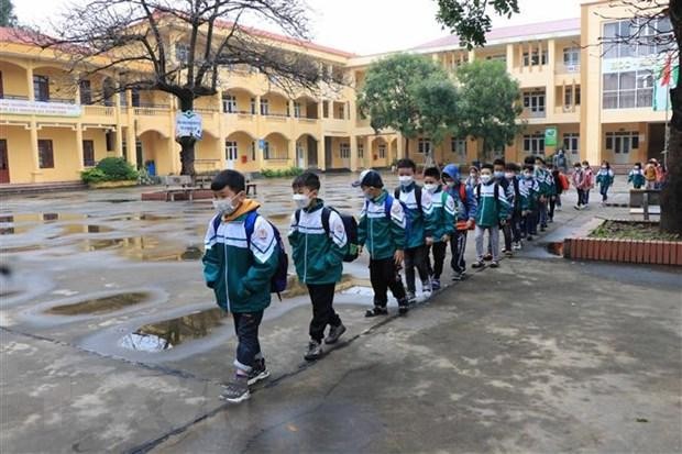 Học sinh Trường Tiểu học Phượng Mao, huyện Quế Võ, tỉnh Bắc Ninh thực hiện giãn cách phòng dịch COVID-19. (Ảnh: Thanh Thương/TTXVN).
