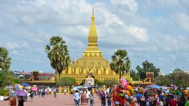Khách du lịch tại thủ đô Vientiane. (Nguồn: TTXVN).