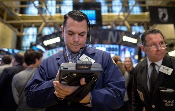 Cổ phiếu năng lượng, cùng nhiều nhóm cổ phiếu khác giúp Dow Jones thiết lập đỉnh cao lịch sử mới - Ảnh: Reuters