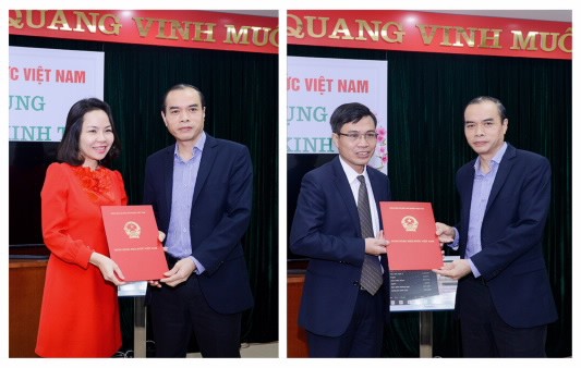 Phó thống đốc Nguyễn Đồng Tiến trao quyết định bổ nhiệm cho bà Hà Thu Giang và ông Trần Văn Tần