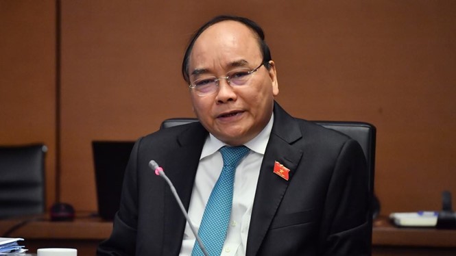 Thủ tướng Nguyễn Xuân Phúc phát biểu thảo luận tại tổ sáng 24/10. Ảnh: TNO