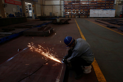 Công nhân trong một nhà máy của Trung Quốc. Ảnh:Reuters