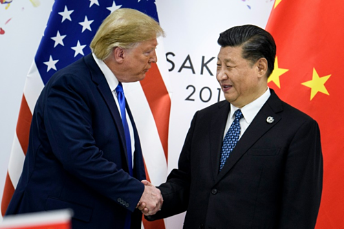 Tổng thống Mỹ Donald Trump (trái) gặp Chủ tịch Trung Quốc Tập Cận Bình sáng 29/6.Ảnh: AFP