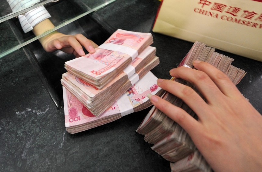 IMF vừa đưa đồng nhân dân tệ của Trung Quốc vào rỏ tiền tệ chung (Ảnh minh họa: AFP)