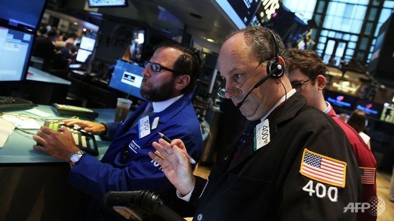 Giới đầu tư tỏ ra lo lắng sau khi Fed phát đi tín hiệu thận trọng về kinh tế thế giới (Ảnh minh họa: AFP)