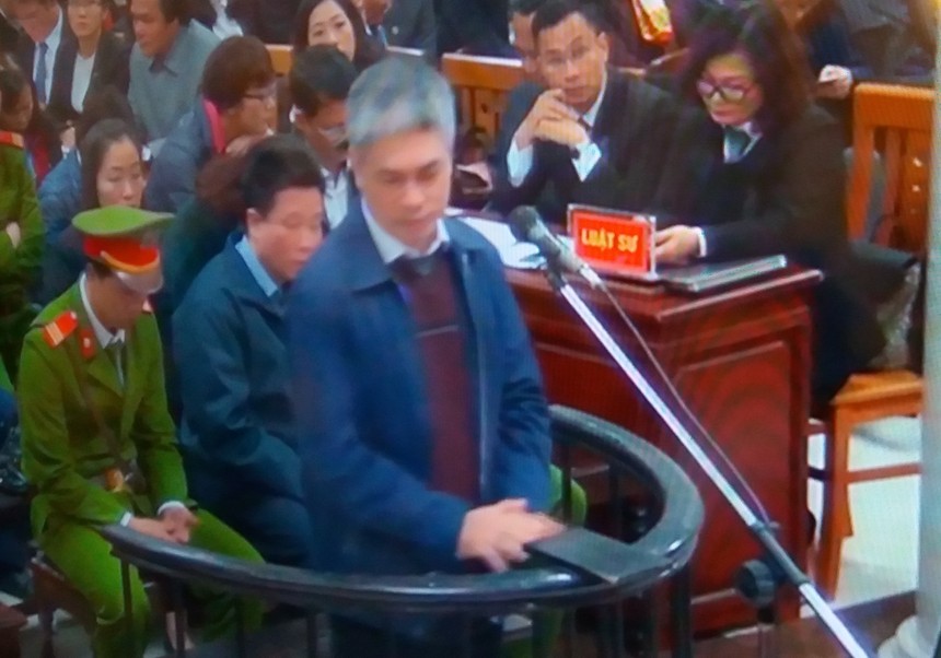 Bị cáo Nguyễn Xuân Sơn tại tòa (Ảnh chụp qua màn hình)
