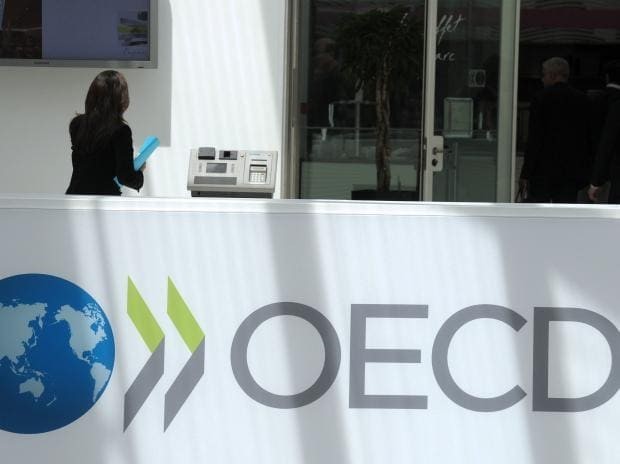 OECD: Lạm phát dai dẳng, lãi suất tăng sẽ đè nặng lên nền kinh tế toàn cầu