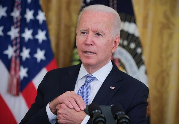Tổng thống Mỹ Joe Biden trả lời câu hỏi từ báo giới tại Nhà Trắng. Ảnh: REUTERS