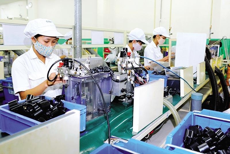 Dây chuyền sản xuất tự động linh kiện xe máy Honda ở Công ty TNHH Việt Nam Toyo Denso (VNTEC) - Thành viên của Toyo Denso Group, Nhật Bản tại KCN Nam Sách. Ảnh: Thành Chung