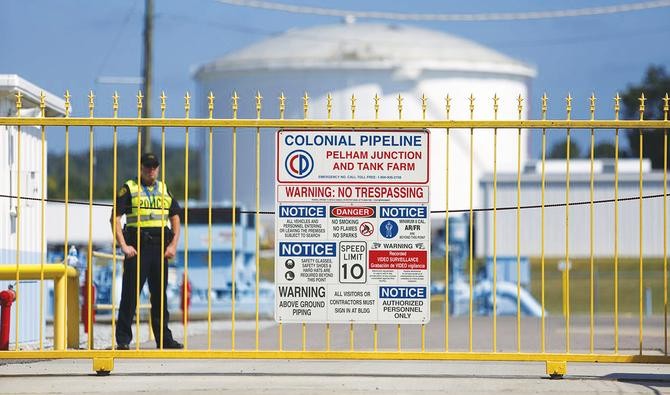Bản chất của cuộc tấn công mạng nhằm vào Colonial Pipeline chưa được xác định trong khi đối tượng và động cơ thực hiện vụ tấn công vẫn là dấu hỏi. Ảnh tư liệu: AFP