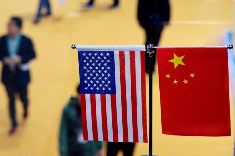 Các chuyên gia China Finance 40 nhận định, Mỹ sẽ vẫn duy trì các mức thuế quan bổ sung đối với 370 tỷ USD giá trị hàng hóa nhập khẩu từ Trung Quốc. Ảnh: AFP