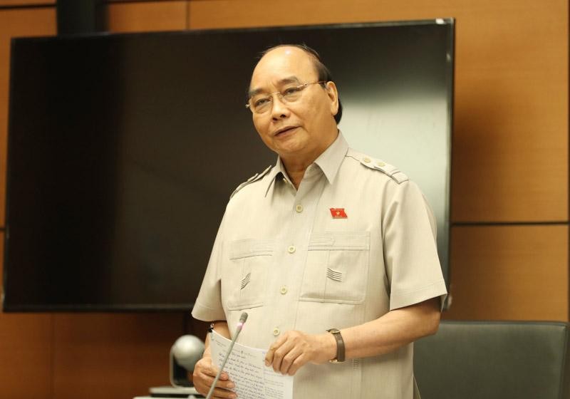 Chủ tịch nước Nguyễn Xuân Phúc tại phiên họp tổ chiều 22/7.