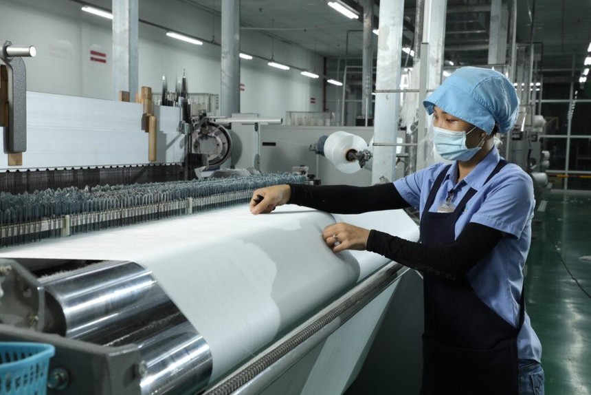 Công nhân làm trong xưởng dệt của Công ty cổ phần Dệt may đầu tư thương mại Thành Công (ảnh: TCM).