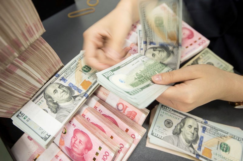 Nhà đầu tư nước ngoài được dự báo sẽ tiếp tục bán ra trái phiếu chính phủ Trung Quốc trong năm 2023. Ảnh: AFP