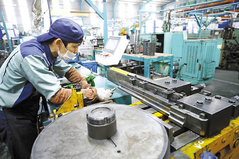 Sản xuất gặp nhiều khó khăn, song tăng trưởng GDP của Việt Nam năm nay vẫn thuộc nhóm cao nhất thế giới. Ảnh: Đ.T 