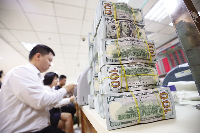 Tỷ giá USD được dự báo có xu hướng giảm trong năm 2024. Ảnh: Dũng Minh