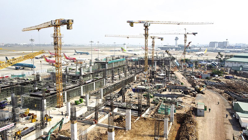 Trên công trường Nhà ga T3 - sân bay Tân Sơn Nhất dịp Tết Nguyên đán sẽ có khoảng 1.400 nhân công thi công tại công trường. Ảnh: Lê Quân