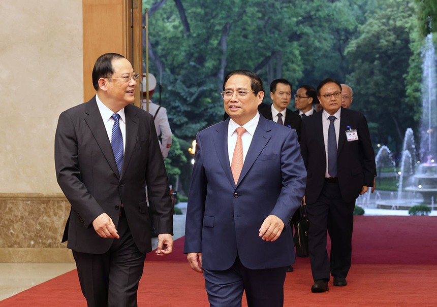 Thủ tướng Chính phủ Phạm Minh Chính gặp làm việc với Thủ tướng Chính phủ nước Cộng hòa Dân chủ Nhân dân Lào Sonexay Siphandone nhân dịp tham dự Diễn đàn Tương lai ASEAN tại Hà Nội. (Ảnh: Đức Thanh)