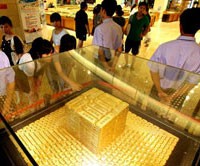Nhu cầu vàng tăng cao tại Trung Quốc dẫn đến sự xuất hiện của vàng giả cực kỳ tinh vi ở Hồng Kông - Ảnh: AFP