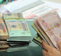 Tiền đồng ngoài “cửa” ngân hàng - nguồn cơn lạm phát